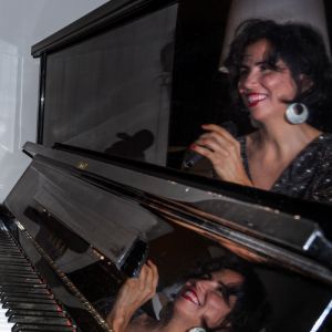 LINDA L.